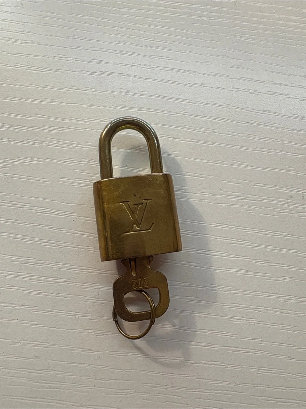 Louis Vuitton Brass Padlock and Key Set in Antique Gold-Tone